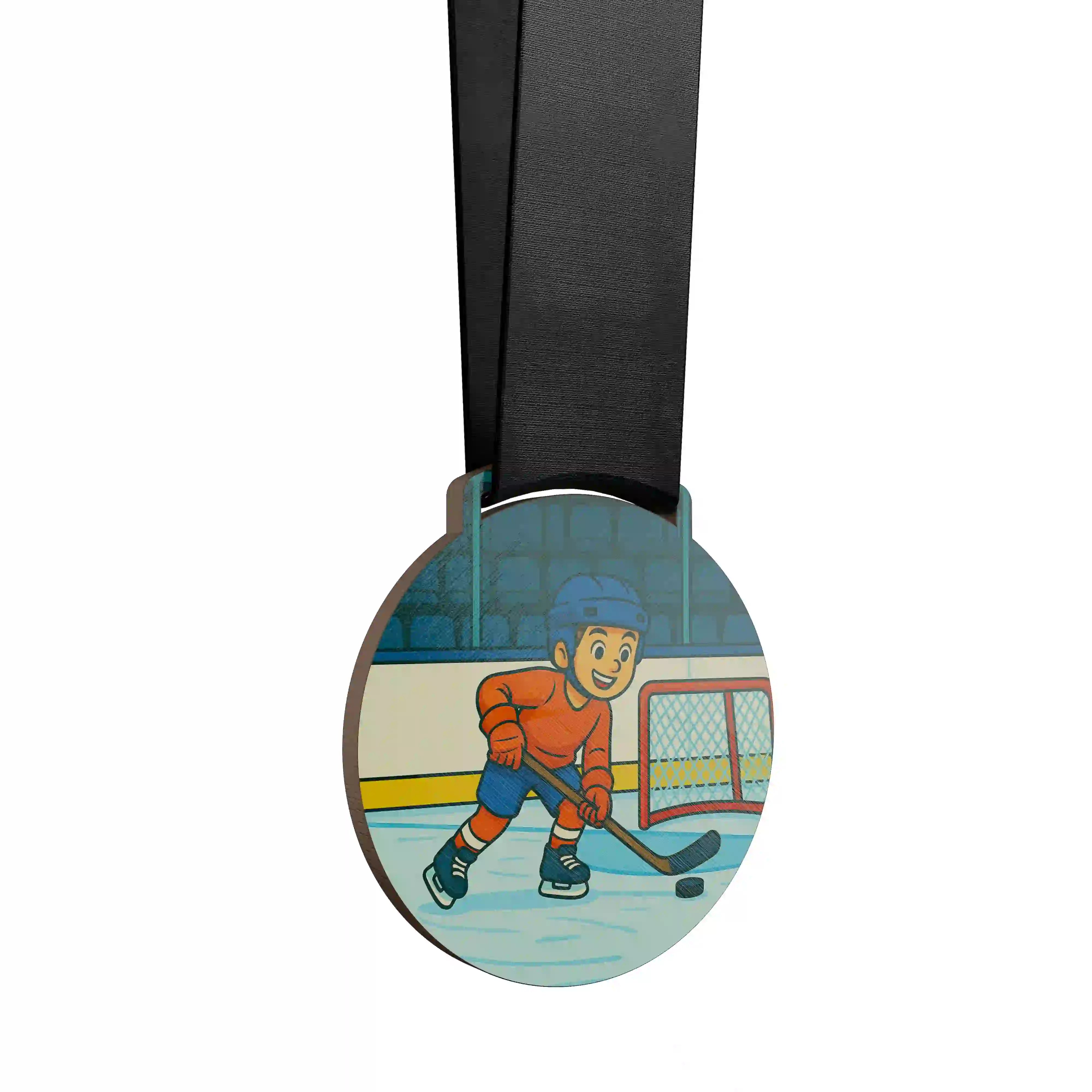 Petit garçon jouant au hockey sur glace, concentré sur le palet.
